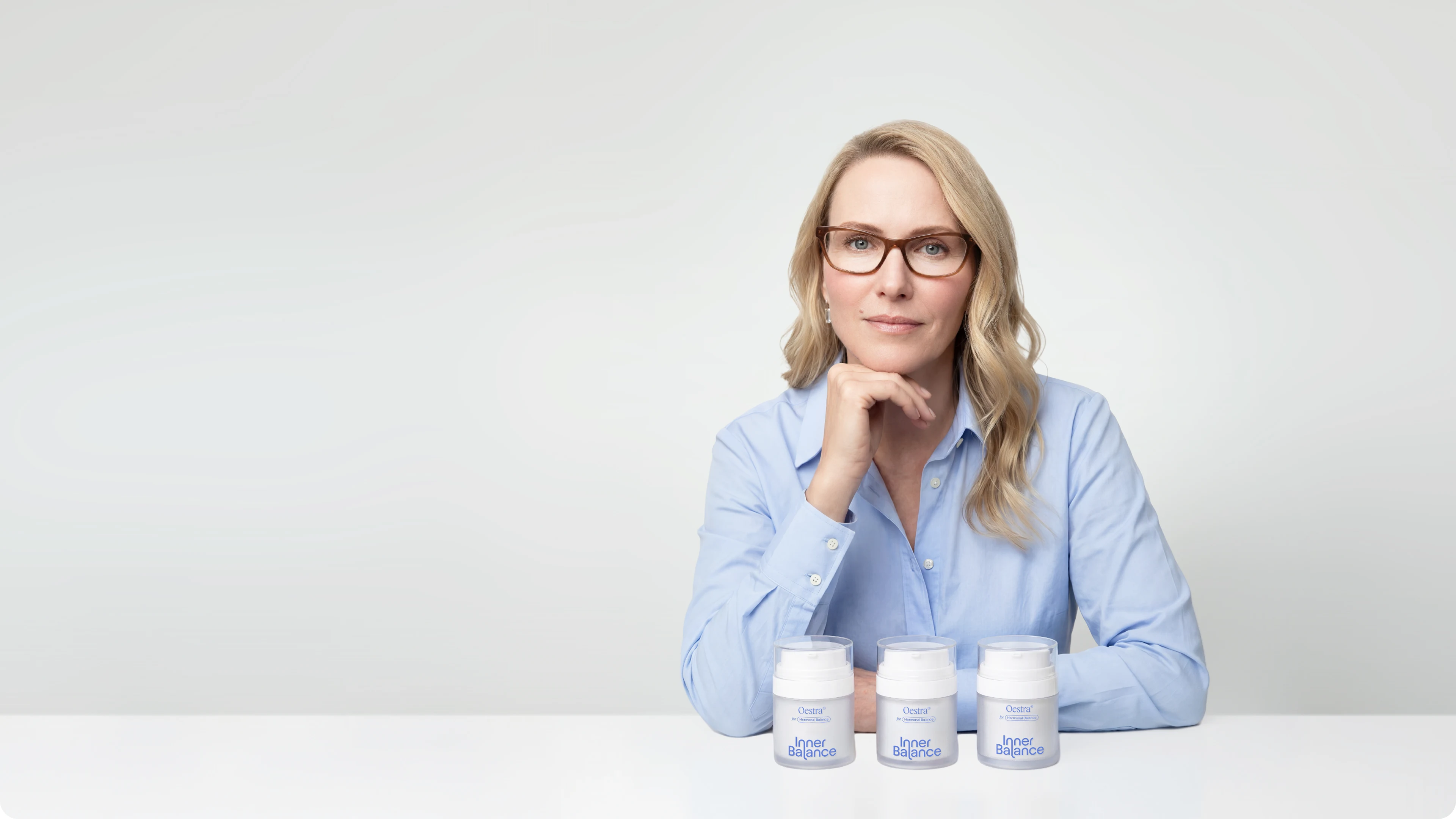 Woman considering Oestra® hormonal balance cream for perimenopause