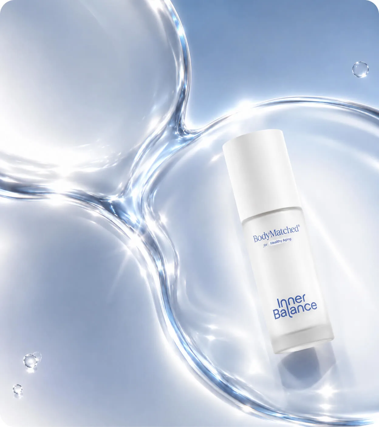 Hand holding a bottle of BodyMatched® face cream