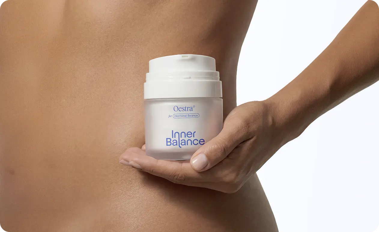 Woman holding Oestra vaginal hormone cream