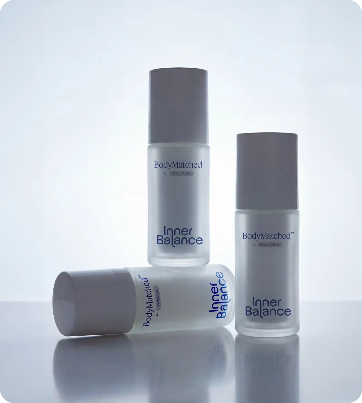 Three bottles of BodyMatched® niacinamide face cream